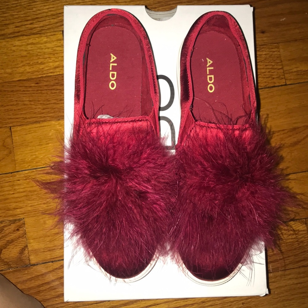 Aldo red velvet slip ons with feathered ball.